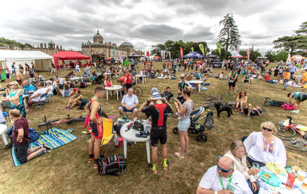 Elite athletes and triathlon superheroes conquer swim, bike and run challenges at Castle Howard